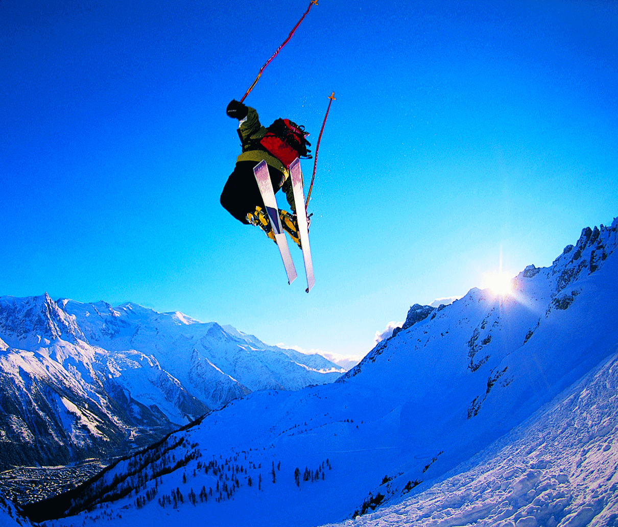 air during skiing down the mounina beautiful mountain background